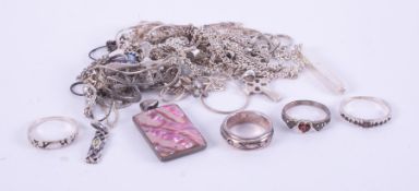 A small mixed lot of silver & costume jewellery including necklaces, rings, chains, etc.