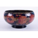 William Moorcroft, a large footed bowl of Pomegranate design, diameter 28cm.