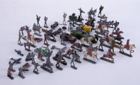 A collection of vintage lead figures, animals, soldiers, etc.