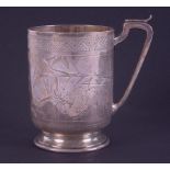 A Victorian silver and gilt lined cup decorated with birds and branches, London hallmark, letter E