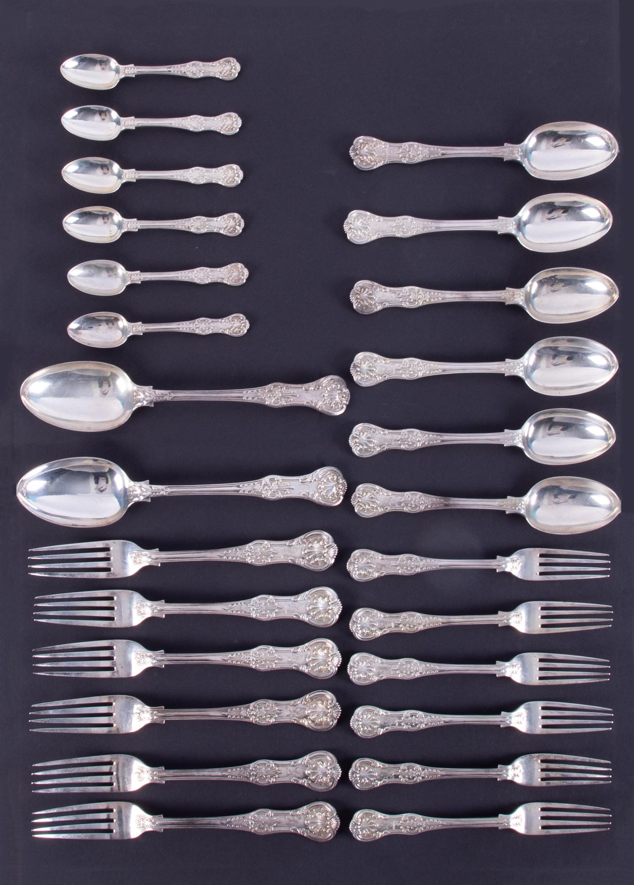 A Victorian Queens pattern six setting silver matched flatware comprising six forks, six desert