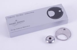 A boxed silver Georg Jensen key ring designed by Andreas Mikkelsen and a circular silver bead