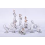 A collection of Lladro figurines including polar bear, ducks, rabbit etc (13).