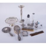 A collection of silver backed dressing table wares, also a silver vase with anniversary