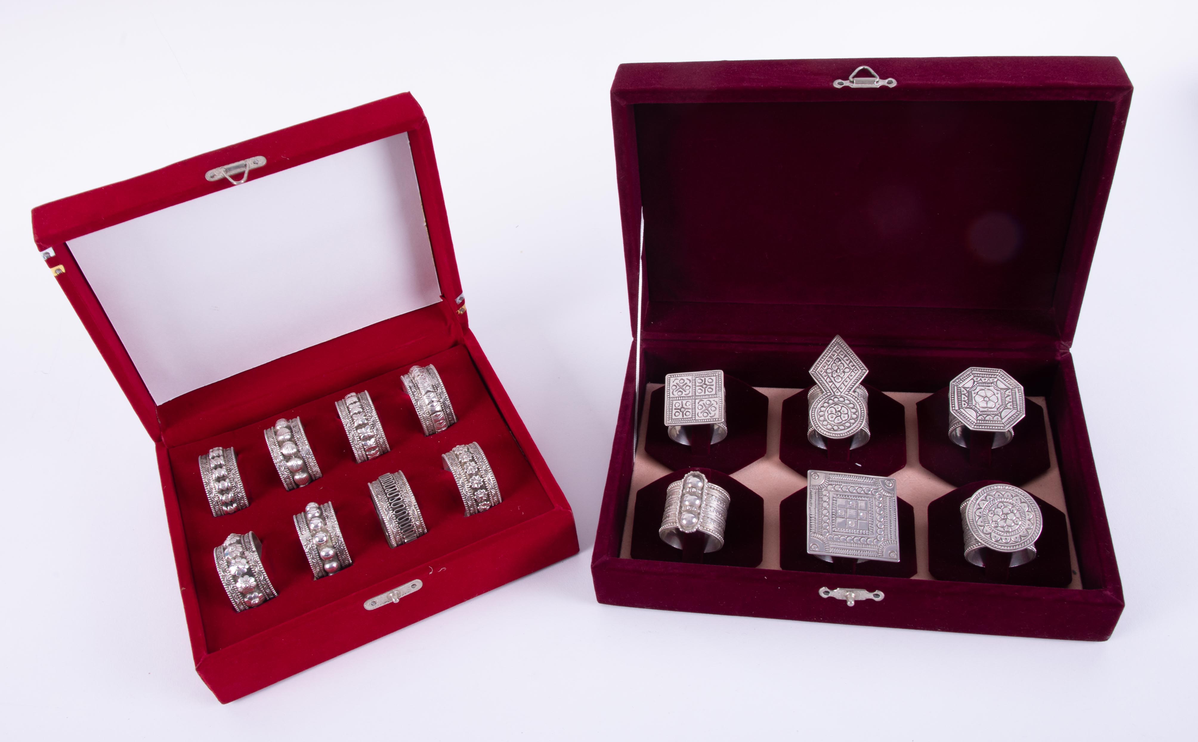 A set of six Eastern silver napkin rings, marked Oman 925 in velvet red case together with a set