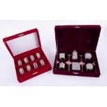 A set of six Eastern silver napkin rings, marked Oman 925 in velvet red case together with a set