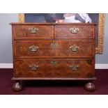 A William and Mary oyster veneered chest of drawers, height 78cm, width 99cm, fitted with two