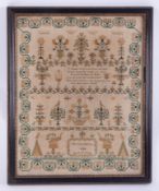 A 19th century needlework sampler, verse, symbols, etc, Mary Ann Harris, 1846, aged 10 years, 40cm x