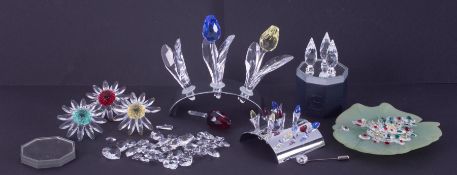 Swarovski Crystal Glass, mixed lot including mini Tulips, larger Tulips, stands etc (red tulip