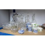 A collection of various glassware including decanters, drinking glasses, claret jug and various