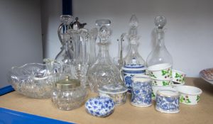 A collection of various glassware including decanters, drinking glasses, claret jug and various