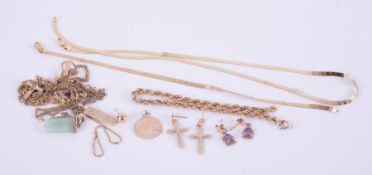 A mixed lot of 9ct yellow gold pendants & chains and other gold jewellery to include jade & amethyst