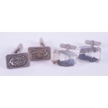 A pair of rectangular silver cufflinks with a central flower pattern, stamped 925, Denmark, GJ (