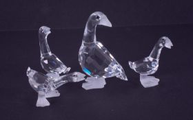 Swarovski Crystal Glass, collection of four Geese, boxed.