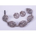 A Danecraft silver oval link flower bracelet and a pair of boxed silver flower design circular