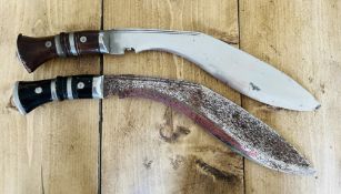 Two Kukri knives in the style of WWII but post WWII with blades, length 30.5cm, the scabbard is