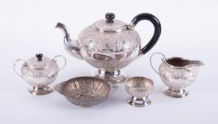 A collection of various middle Eastern silverware, hallmarked, comprising tea pot, sugar & cream