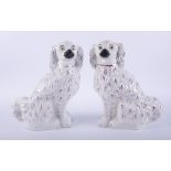 Pair of large flat back Staffordshire spaniel dogs, height 35cm.