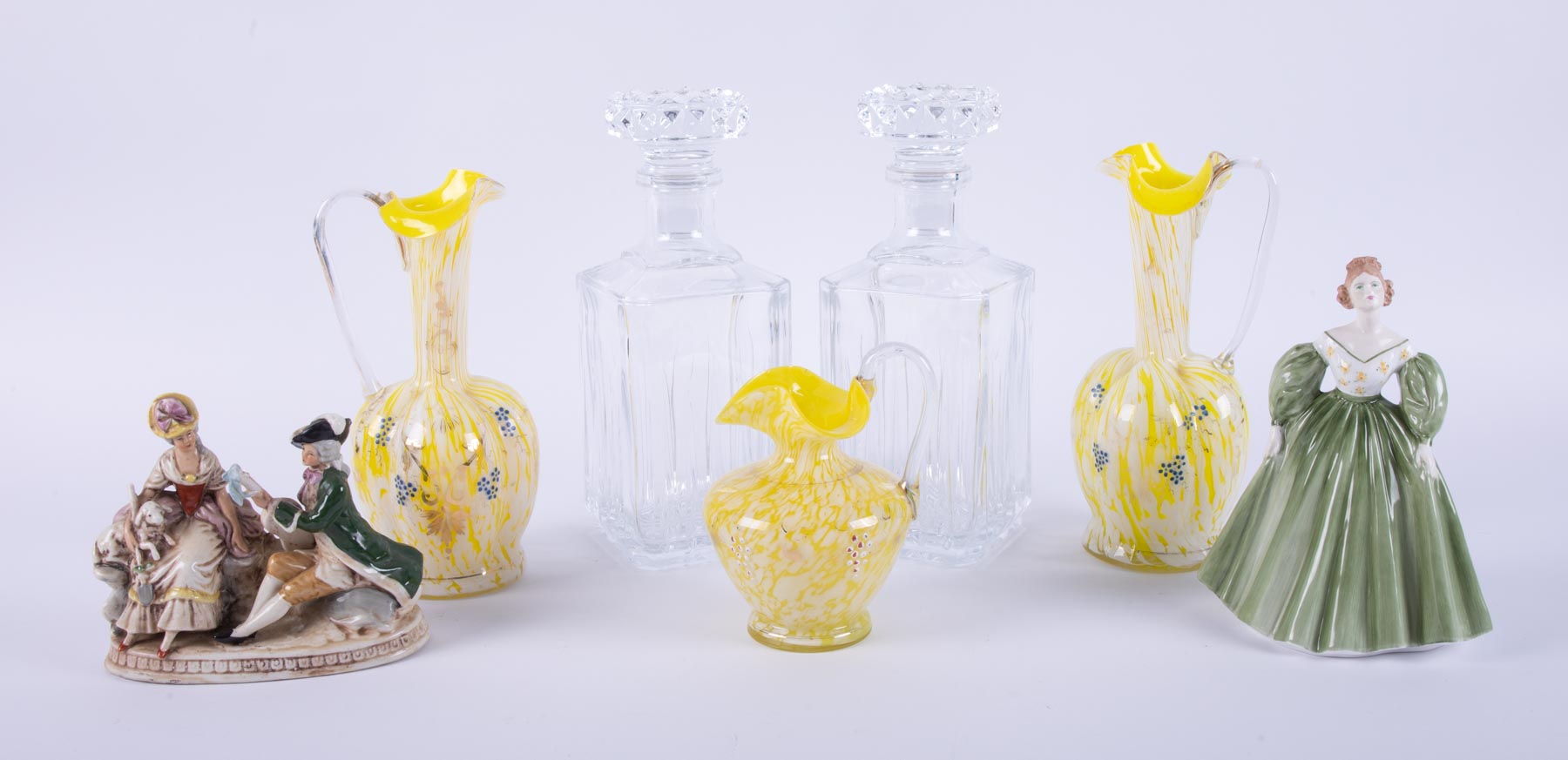 Two glass decanters with stoppers, set of three yellow coloured murano? glass, pair of