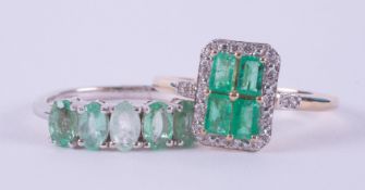 Two rings to include a 9ct yellow gold ring set with four baguette cut Colombian emeralds, total