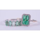 Two rings to include a 9ct yellow gold ring set with four baguette cut Colombian emeralds, total