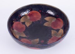 William Moorcroft, a footed Pomegranate bowl, diameter 25cm.