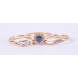 Three 18ct yellow gold rings to include a cluster style ring set with a sapphire, approx. 0.25