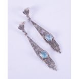 A pair of silver Art Deco style drop earrings set with marcasite & hexagonal shaped blue topaz,