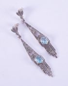 A pair of silver Art Deco style drop earrings set with marcasite & hexagonal shaped blue topaz,