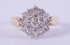 An 18ct yellow gold cluster ring set with 1.00 carat of round brilliant cut diamonds, approx. colour