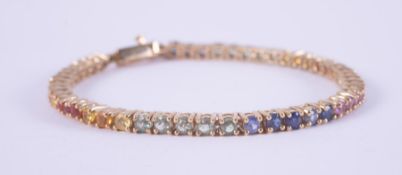 A 9ct yellow gold line bracelet set with multi-coloured sapphires, total weight approx. 4.80 carats,