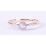 An 18ct yellow gold & platinum single stone ring set with an older round cut diamond, approx. 0.40