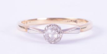 An 18ct yellow gold & platinum single stone ring set with an older round cut diamond, approx. 0.40
