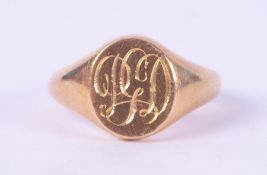 An 18ct yellow gold oval signet ring, table engraved PGD, 10.64gm, size P.