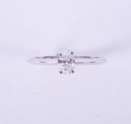 A fine 14ct white gold ring set with a 0.50 carat oval cut diamond, colour F & VS2 clarity,