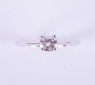 A 14ct white gold ring set with a 0.50 carat round brilliant cut diamond, colour F, VS2 clarity,