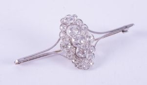 A fine Art Deco brooch set with approx. just over 3.00 carats total weight of old round cut diamonds