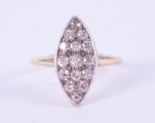 An antique 18ct yellow gold & platinum marquise shaped ring set with old round cut diamonds, total