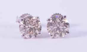 A pair of fine 18ct white gold diamond stud earrings set with approx. 2.00 carats of round brilliant