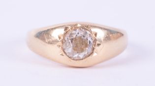 An antique 18ct yellow gold ring set with an old slightly off round cut diamond, approx. 0.71