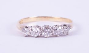 An 18ct yellow gold & platinum five stone ring set with old round brilliant cut diamonds, approx.