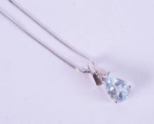 A 9ct white gold pendant set with a pear shaped aquamarine, approx. 1.16 carats with a tiny round