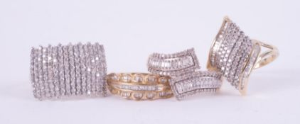 A mixed bag of four 9ct yellow gold rings set with diamonds in different styles, total weight 14.