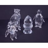 Swarovski Crystal Glass, 'Poodle', 'Penguin', 'Cheetah' and 'Egg', all unboxed.