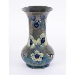 William Moorcroft, Florian blue and green flower tall cylinder vase circa 1902-1911, height 32cm.