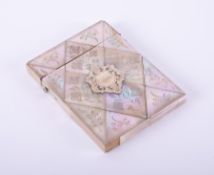 An antique mother of pearl 'calling card' case with leaf & flowering engraving and an ornate