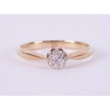 A yellow gold & platinum ring (no hallmarks but assessed to be 18ct), set with an old round cut