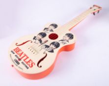 Beatles, a Selco plastic guitar with signatures.