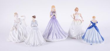 A collection of four Royal Doulton ladies including 'Gift of Love', 'The First Noel' together with