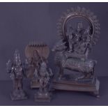 Four bronze deity figures, tallest 29cm.